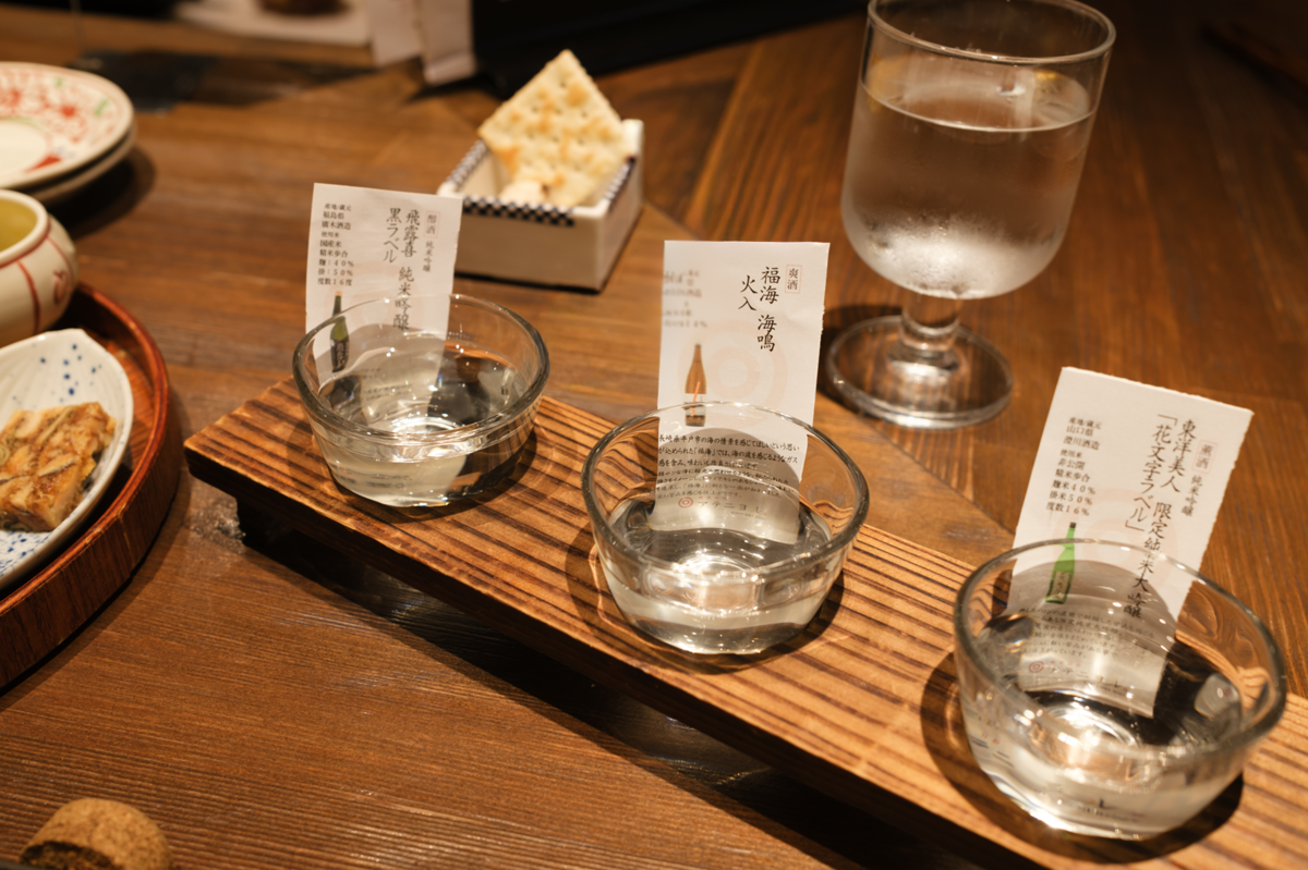 「一口生つき！おまかせ日本酒3種とアテ5種盛りセット」 福島未貴 福島未貴 9:54 4月25日 ファイル https://drive.google.com/file/d/10aTF0daelBAEJL4mGv3cvKk46rM6ga01/view?usp=drive_link  Altテキスト 日本酒飲み比べをする手元