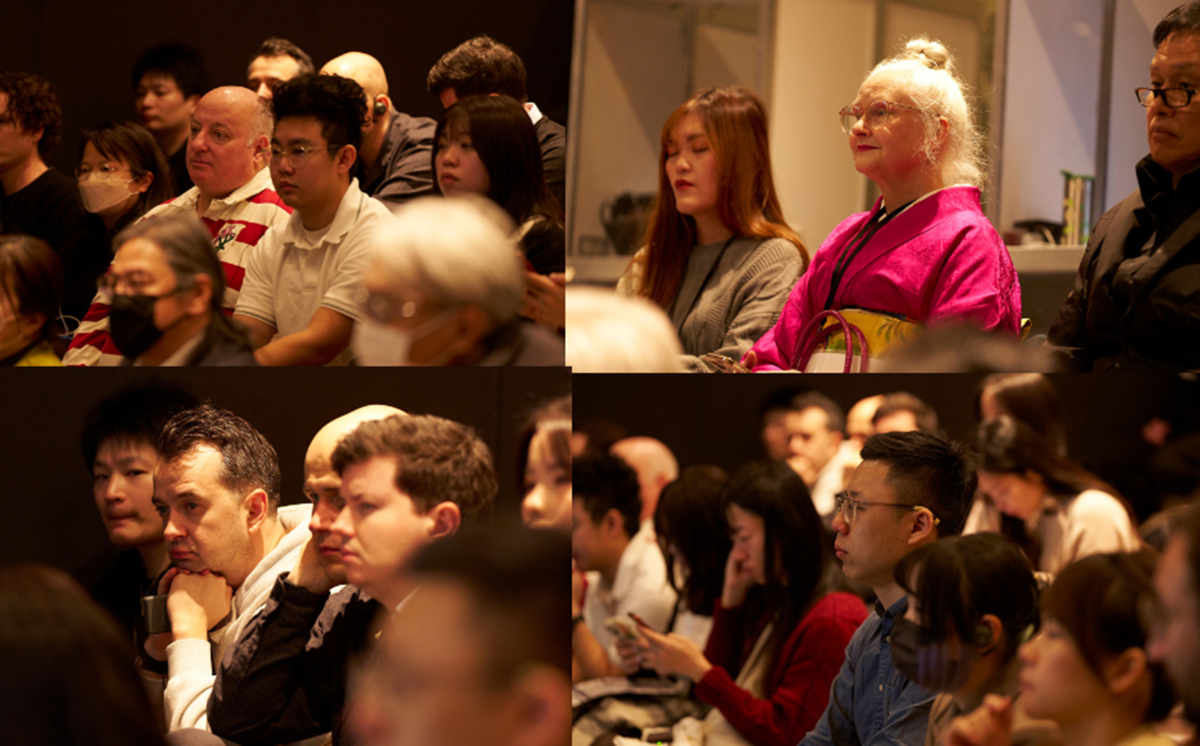 話を聞くインバウンドの人たち