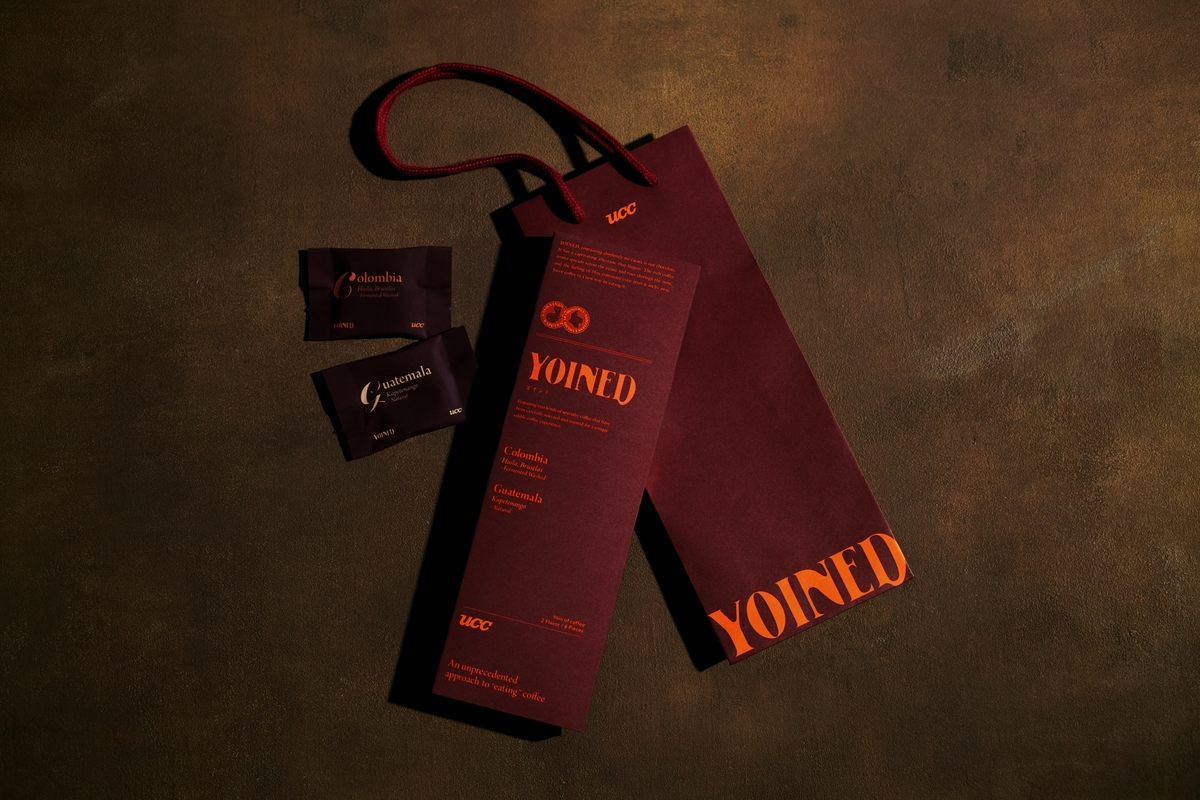 「YOINED」のショッパー